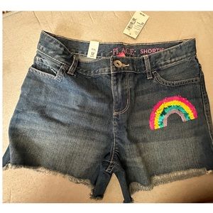 Children’s Place Denim shorts sz 12 New With Tags. Rainbow decals/design.